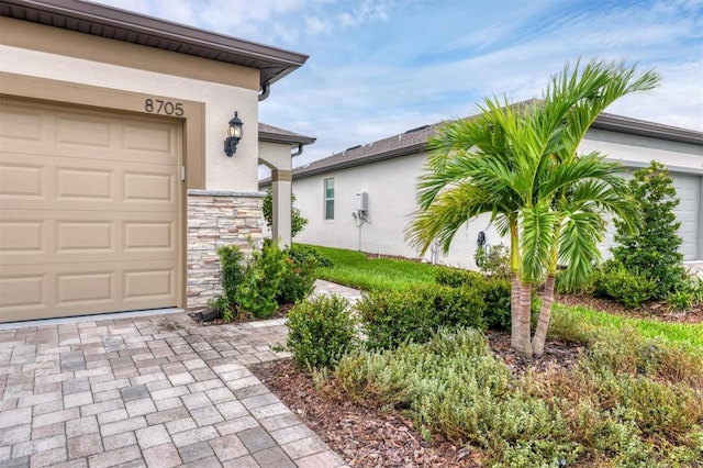 property entrance featuring a garage