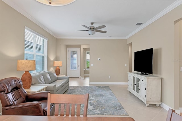 tiled living room featuring ceiling fan and crown molding