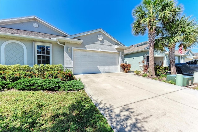 single story home featuring a garage