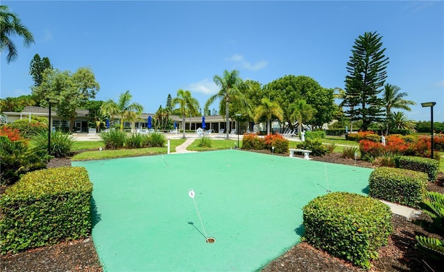 4380 Exeter Dr Unit 303, Longboat Key, FL 34228 - surrounding community with a putting area
