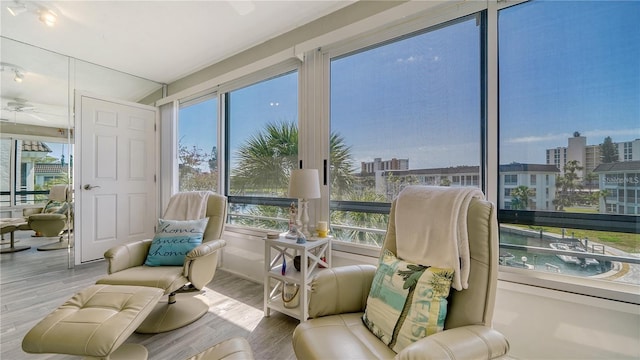 4380 Exeter Dr Unit 303, Longboat Key, FL 34228 - sunroom featuring healthy amount of natural light and a city view