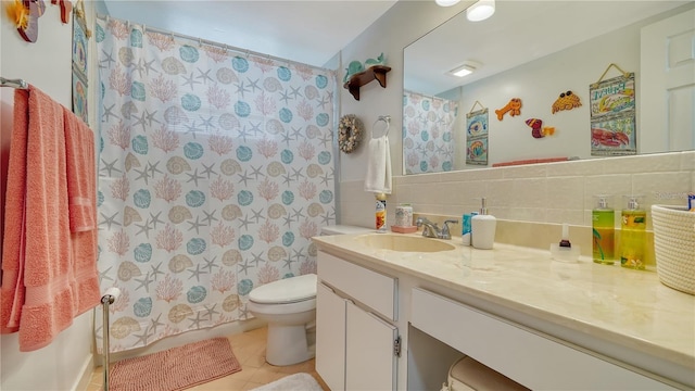 bathroom featuring tile patterned flooring, vanity, tile walls, toilet, and a shower with shower curtain