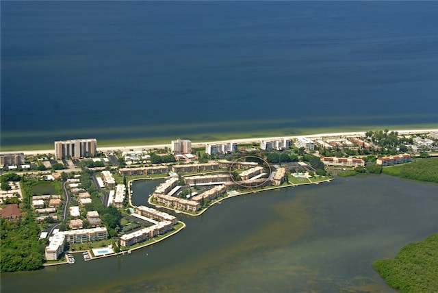 drone / aerial view with a water view