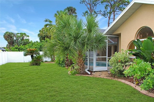 view of yard featuring a lanai