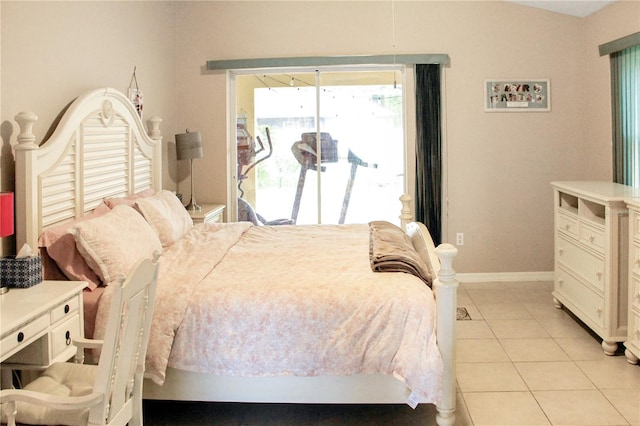 bedroom featuring access to exterior and light tile patterned floors