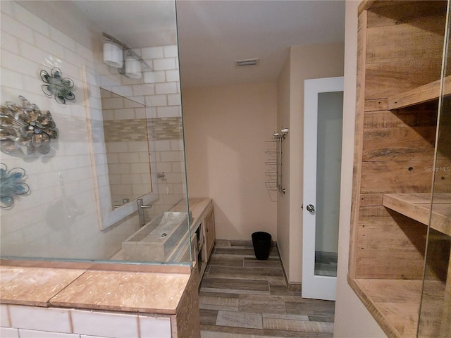 bathroom featuring hardwood / wood-style flooring