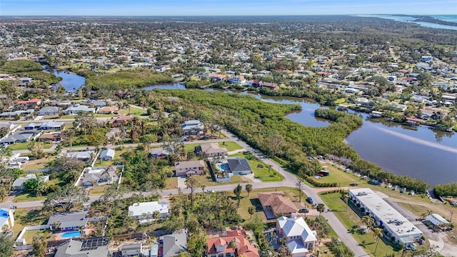 bird's eye view with a water view