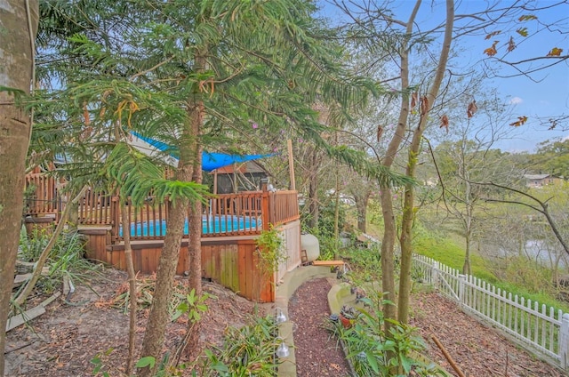 view of yard featuring a pool side deck