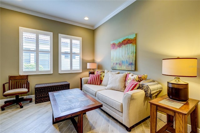 living room with crown molding and light hardwood / wood-style floors