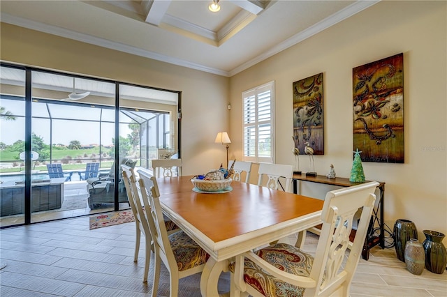 dining space with beamed ceiling and ornamental molding