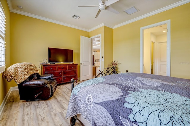 bedroom featuring crown molding, light hardwood / wood-style flooring, and ceiling fan