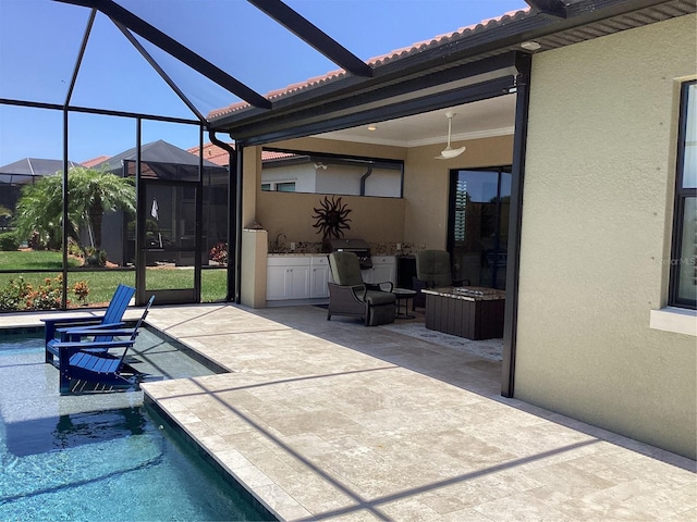 view of patio / terrace with glass enclosure and ceiling fan