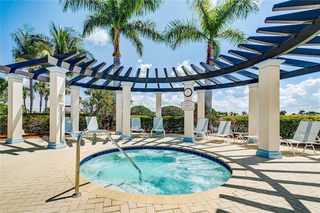 view of pool with a patio area and a pergola