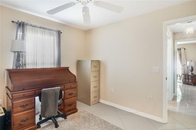 tiled home office with ceiling fan