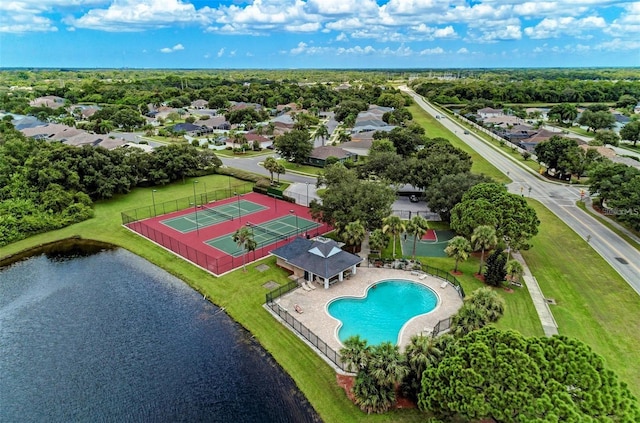 drone / aerial view with a water view