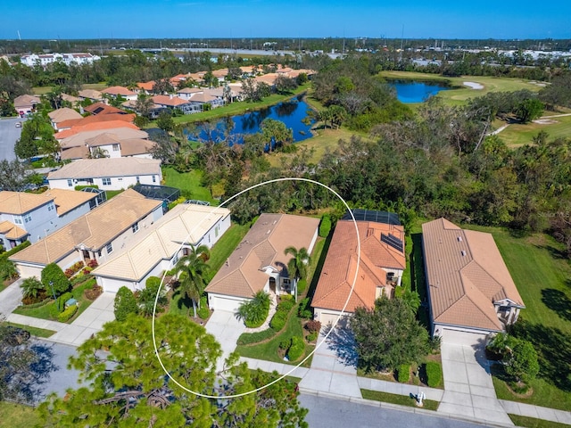 bird's eye view with a water view