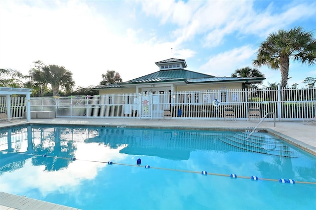 view of pool featuring a patio