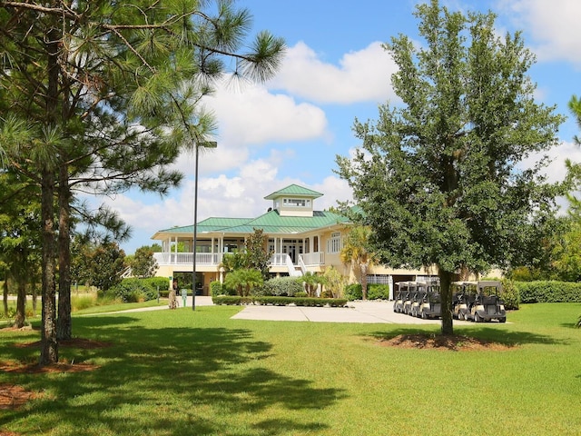 view of home's community featuring a yard