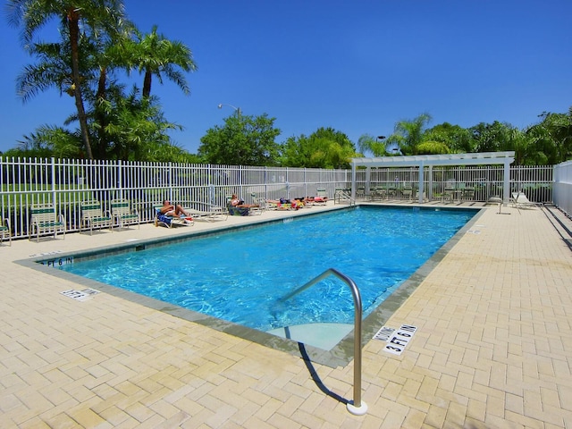 view of swimming pool with a patio