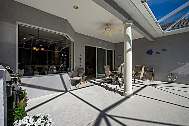 view of patio / terrace featuring ceiling fan