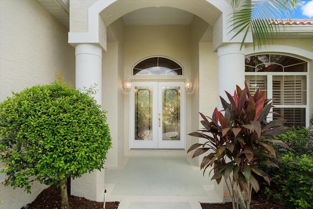 doorway to property featuring french doors