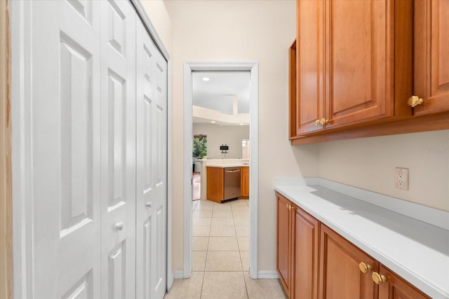 hallway featuring light tile patterned flooring