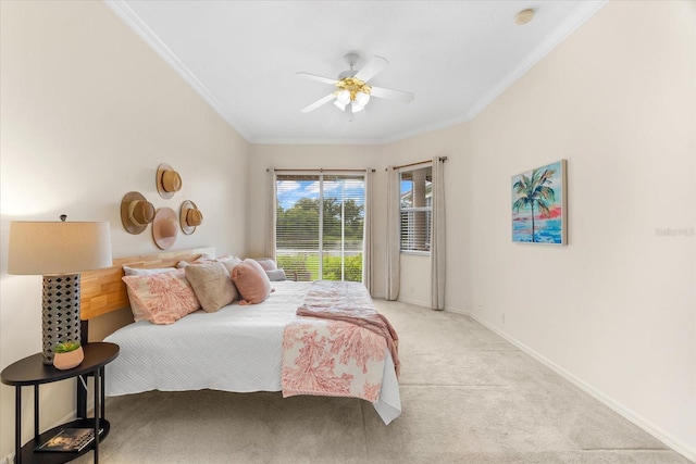 bedroom with light colored carpet, ceiling fan, and ornamental molding