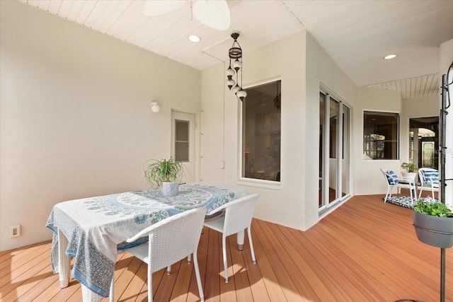 dining area with hardwood / wood-style floors