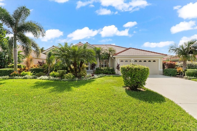 mediterranean / spanish-style house with a front lawn and a garage