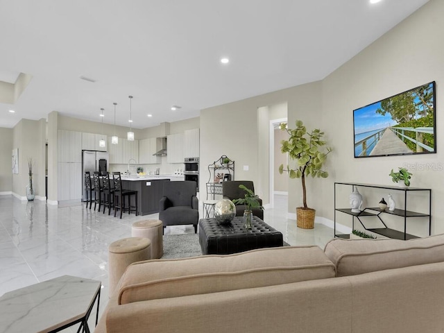 living room featuring sink