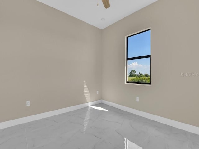 empty room featuring ceiling fan