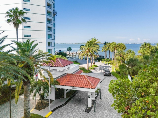 view of home's community featuring a water view