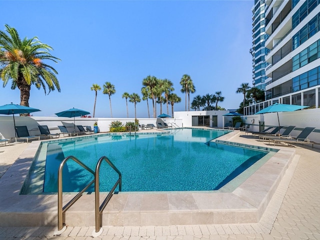 view of swimming pool featuring a patio