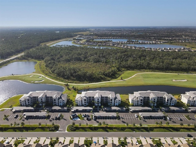 drone / aerial view with a water view