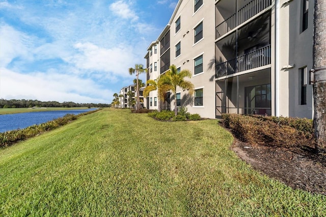 view of property with a water view