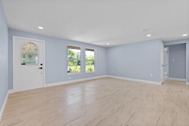 6912 Kenwood Dr, North Port, FL 34287 - foyer with recessed lighting and baseboards