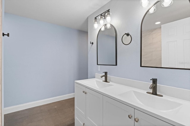 6912 Kenwood Dr, North Port, FL 34287 - bathroom with baseboards and double vanity