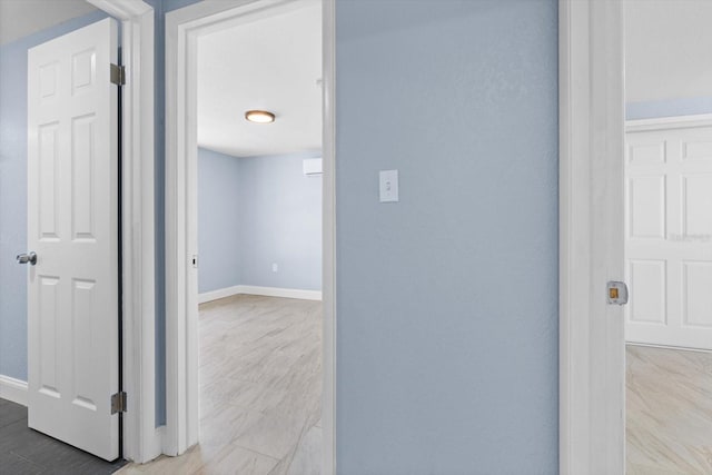 6912 Kenwood Dr, North Port, FL 34287 - corridor featuring baseboards
