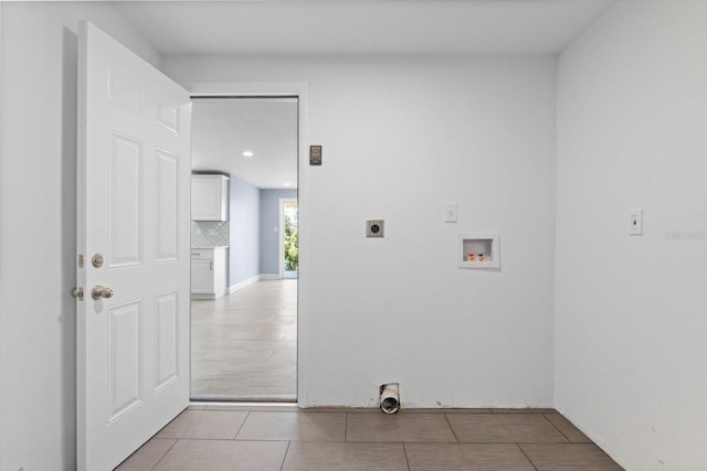 laundry room featuring laundry area, hookup for a washing machine, light tile patterned flooring, hookup for an electric dryer, and recessed lighting