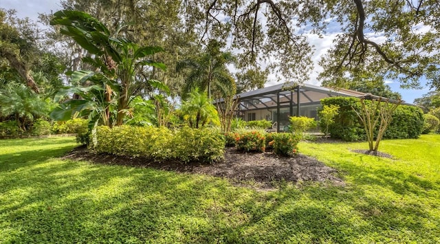 view of yard featuring a lanai