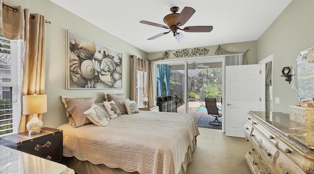 bedroom with access to outside, light carpet, and ceiling fan