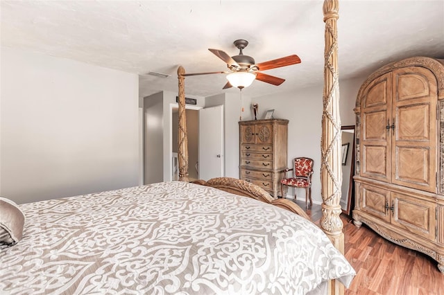 bedroom featuring ceiling fan and hardwood / wood-style floors