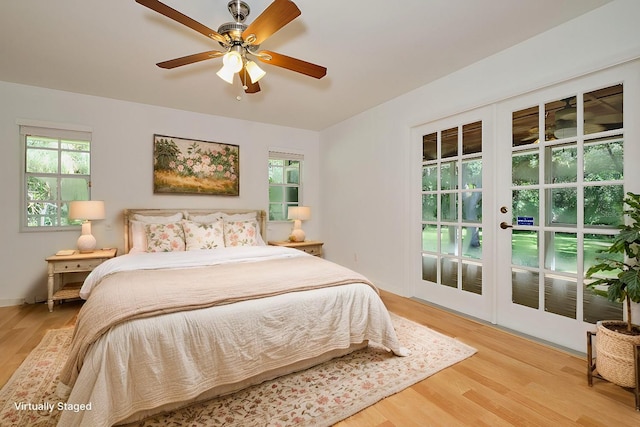 bedroom featuring light wood-type flooring and ceiling fan