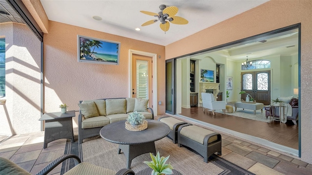 view of patio / terrace featuring an outdoor hangout area and ceiling fan
