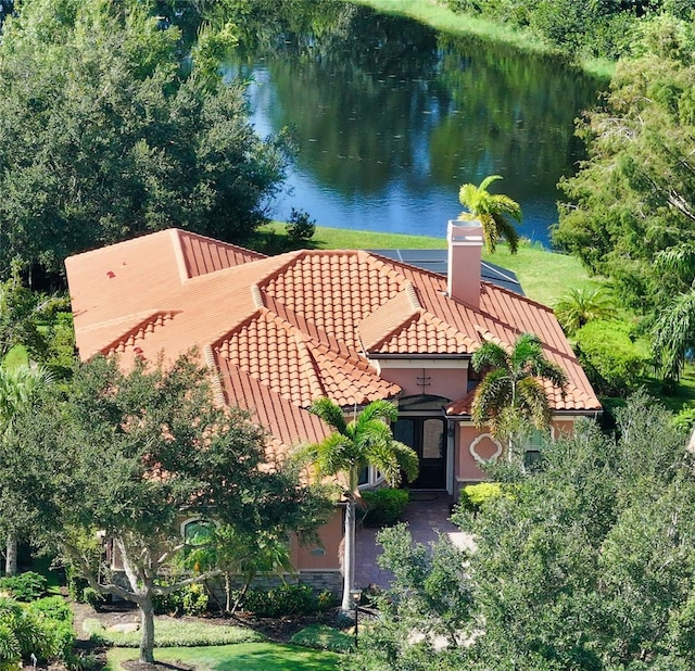 bird's eye view with a water view