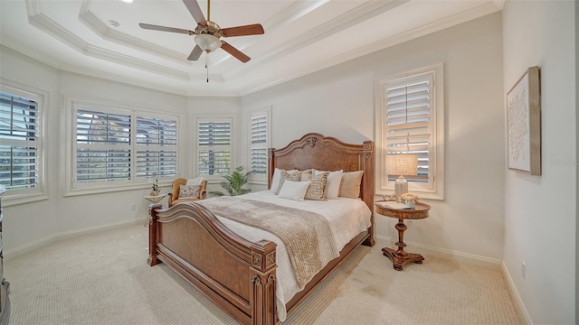 bedroom featuring carpet floors, ornamental molding, baseboards, and ceiling fan
