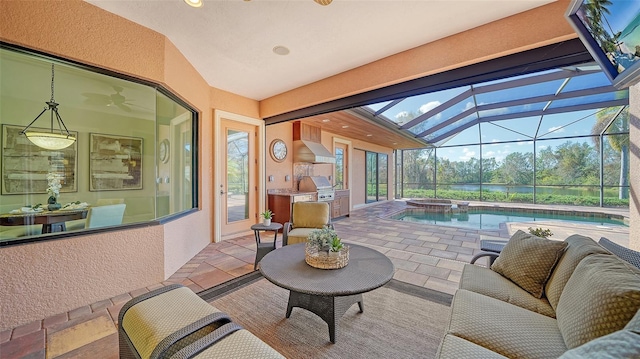 sunroom / solarium featuring a jacuzzi, a pool, a water view, and area for grilling