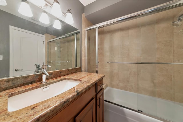 226 Golden Gate Pt Unit 64, Sarasota, FL 34236 - full bathroom with vanity and combined bath / shower with glass door