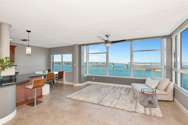 226 Golden Gate Pt Unit 64, Sarasota, FL 34236 - interior space featuring a water view and visible vents