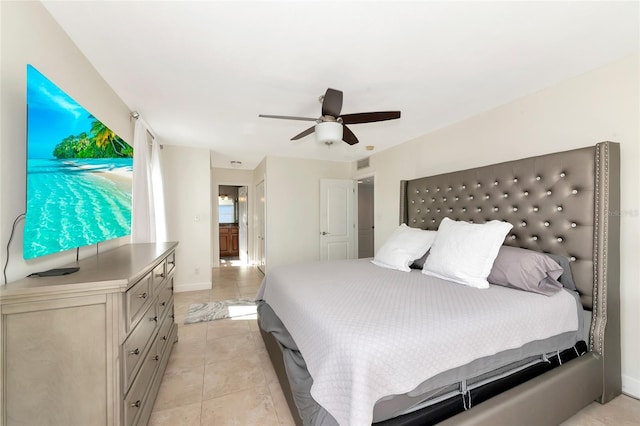 226 Golden Gate Pt Unit 64, Sarasota, FL 34236 - bedroom with baseboards, a ceiling fan, visible vents, and light tile patterned flooring